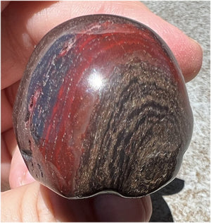 Red Spiral Jasper Crystal Skull with LOTS of Hematite