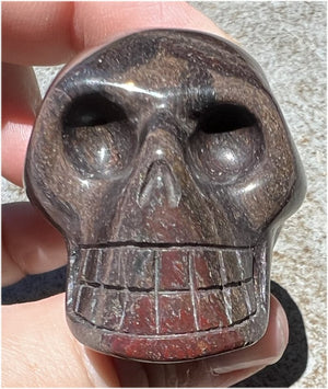 Red Spiral Jasper Crystal Skull with LOTS of Hematite