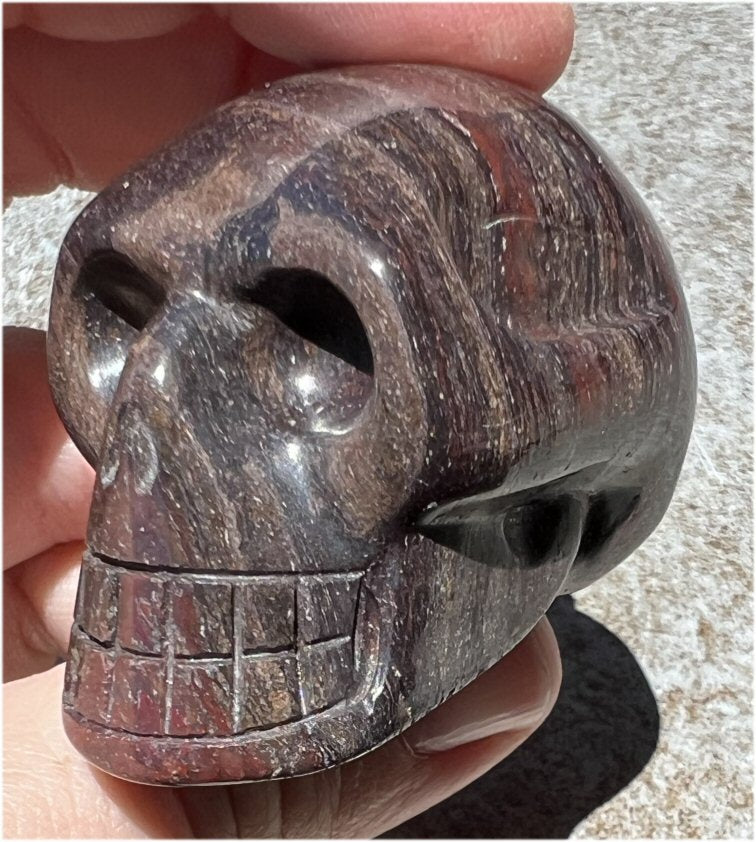 Red Spiral Jasper Crystal Skull with LOTS of Hematite