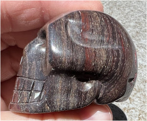 Red Spiral Jasper Crystal Skull with LOTS of Hematite