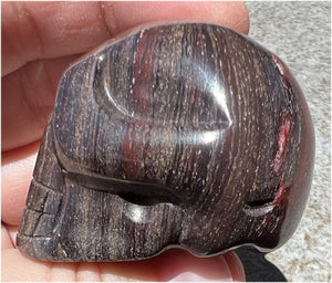 Red Spiral Jasper Crystal Skull with LOTS of Hematite