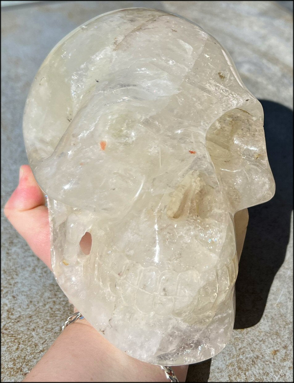 LifeSize Himalayan Quartz Crystal Skull with Manganese Streaking, Shimmery Rainbows, and Multi-Colored Hematite