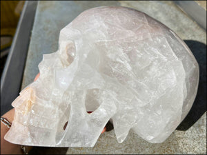 LifeSize Himalayan Quartz Crystal Skull with Gorgeous Hematite inclusions, Shimmery Rainbows - 15lbs+