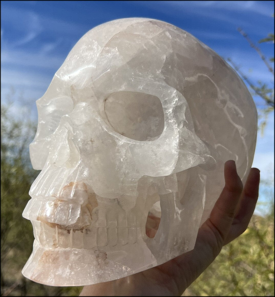 LifeSize Himalayan Quartz Crystal Skull with Gorgeous Hematite inclusions, Shimmery Rainbows - 15lbs+