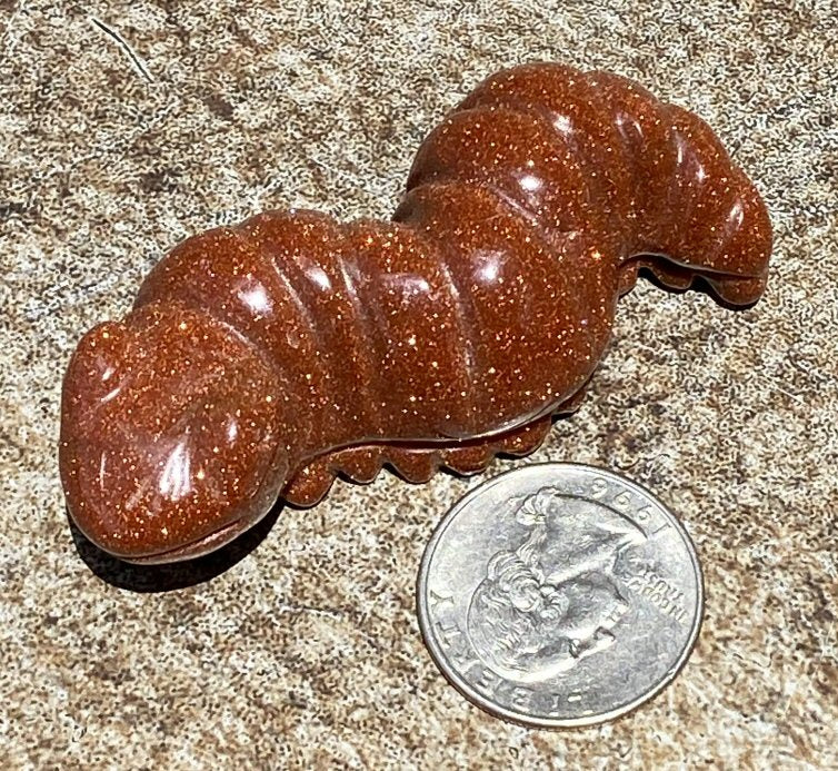 Goldstone CATERPILLAR Totem - Transformation, Determination