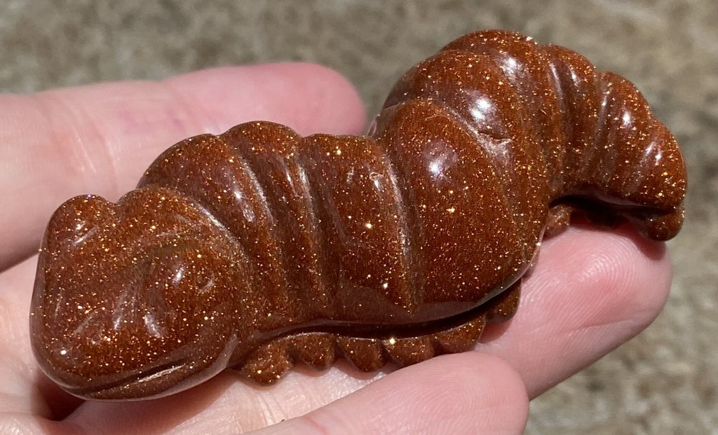 Goldstone CATERPILLAR Totem - Transformation, Determination