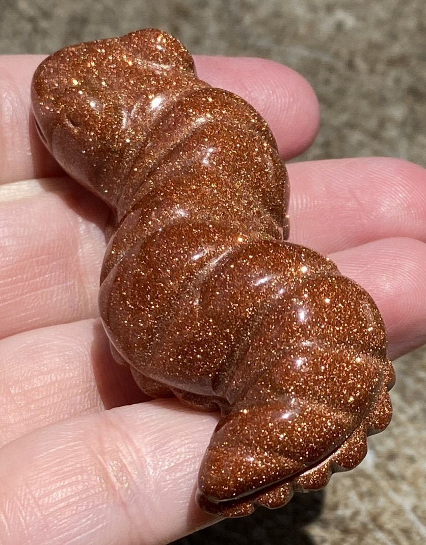 Goldstone CATERPILLAR Totem - Transformation, Determination