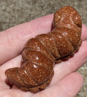 Goldstone CATERPILLAR Totem - Transformation, Determination