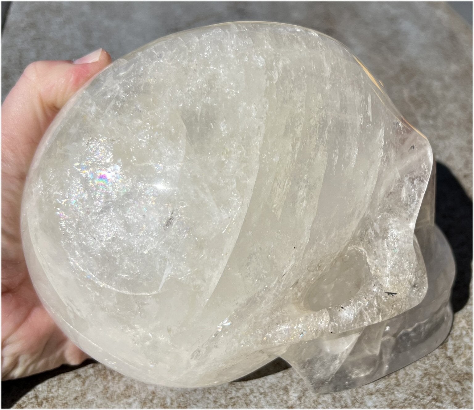 LifeSize Himalayan Quartz Crystal Skull with Multi-Colored Hematite, Lovely Rainbows