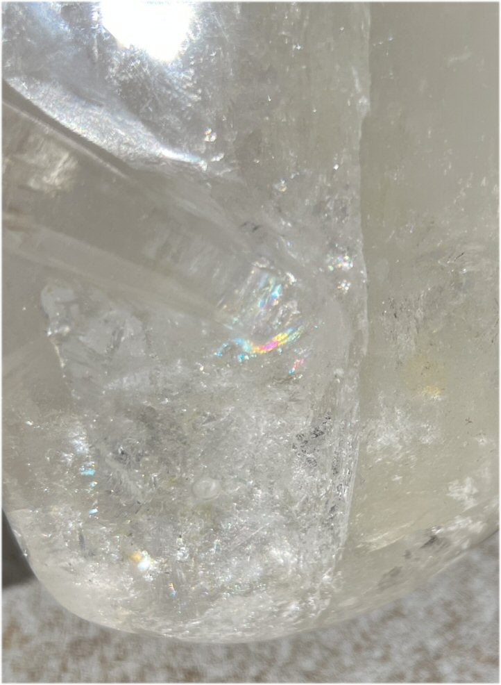 LifeSize Himalayan Quartz Crystal Skull with Multi-Colored Hematite, Lovely Rainbows