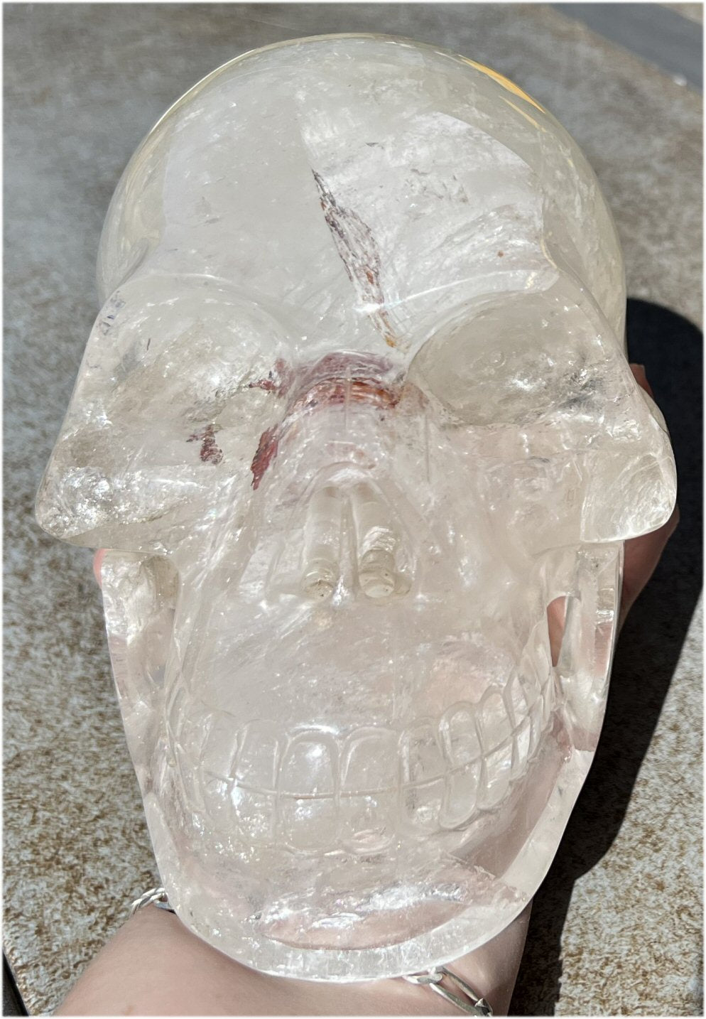 LifeSize Himalayan Quartz Crystal Skull with Multi-Colored Hematite, Lovely Rainbows
