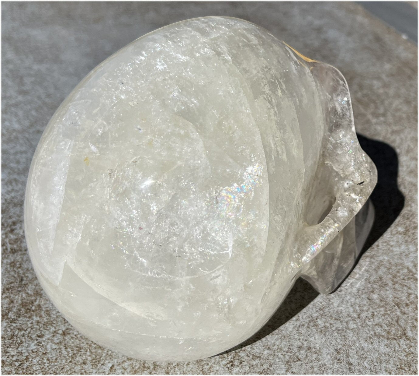 LifeSize Himalayan Quartz Crystal Skull with Multi-Colored Hematite, Lovely Rainbows